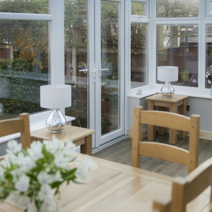 Sun shining through a glass conservatory door
