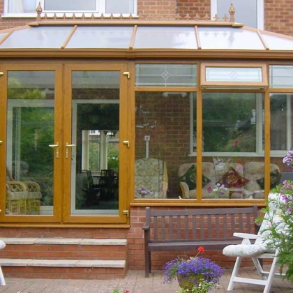 Glazed extension with woodgrain uPVC