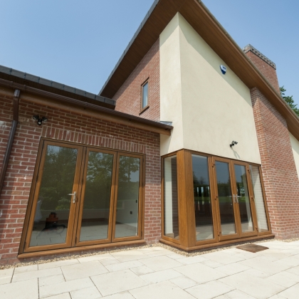 Visage woodgrain PVCu Bi-Fold doors