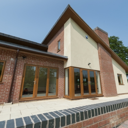 PVCu Bi-Fold doors Visage woodgrain