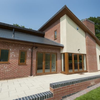 PVCu Bi-Fold doors on a house in the countryside